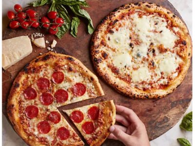 2 whole delicious looking pizzas